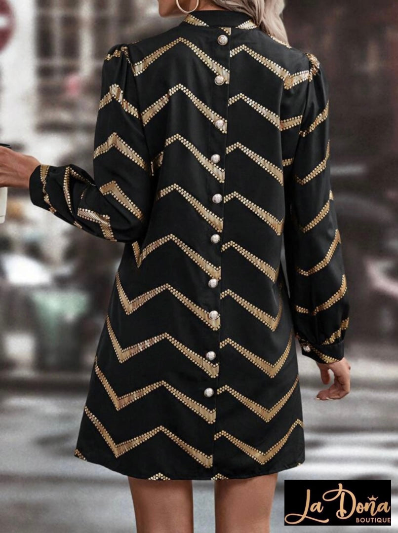 Vestido negro con dorado