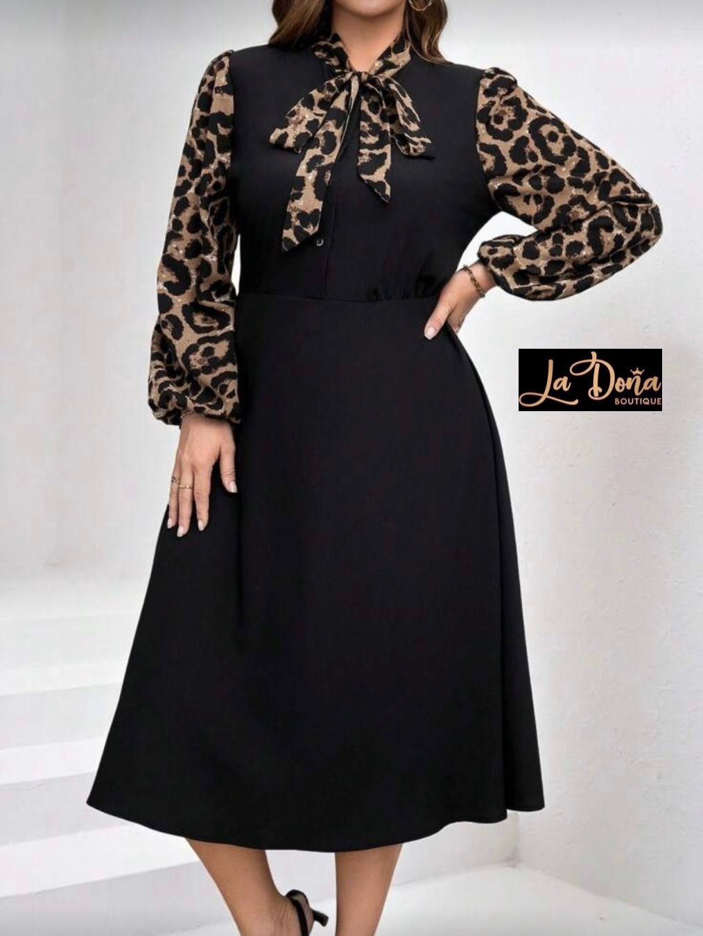 Vestido negro con detalles en leopardo