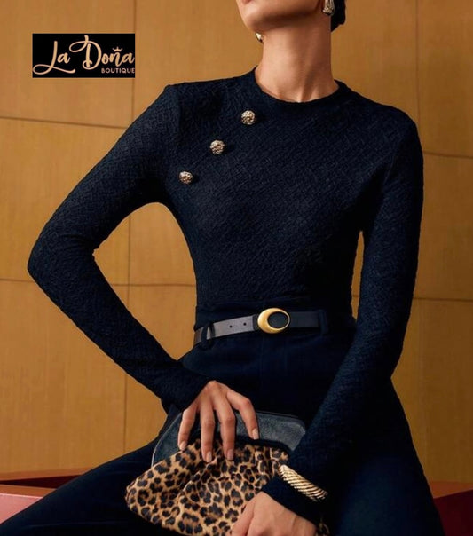 Blusa con botones dorados