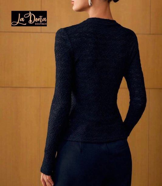 Blusa con botones dorados