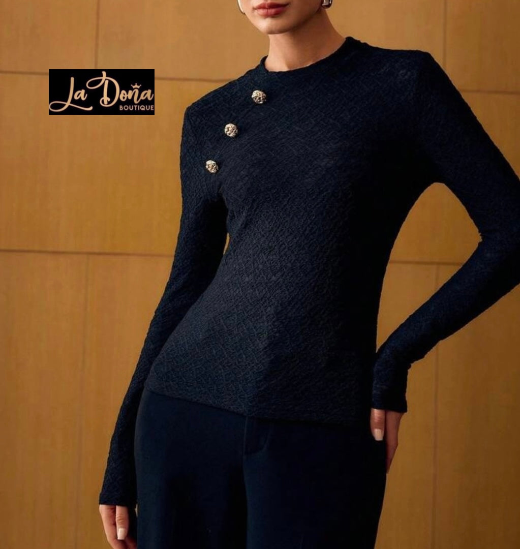 Blusa con botones dorados