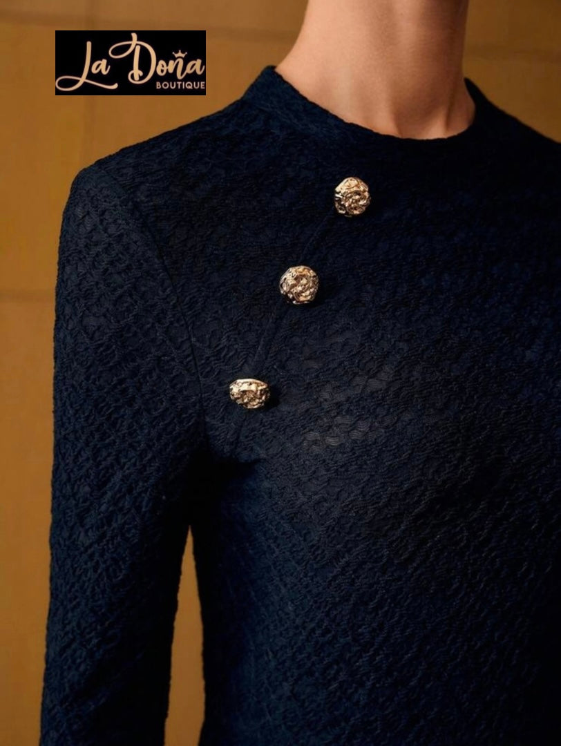Blusa con botones dorados
