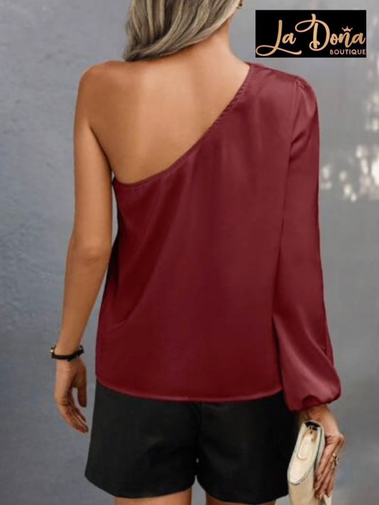Blusa con flor 3D de una manga