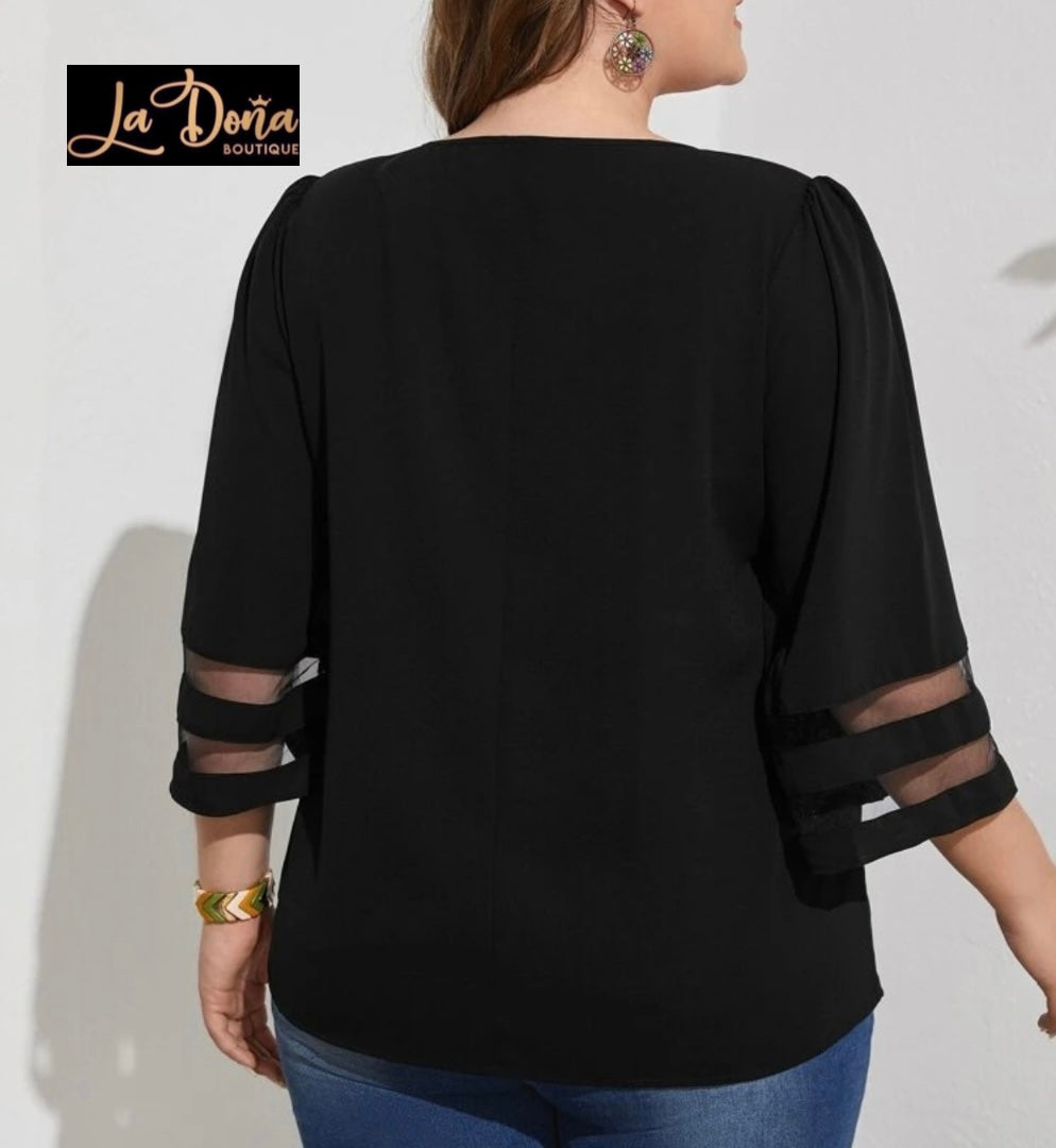 Blusa negra con manga