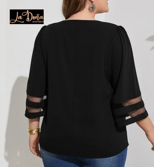 Blusa negra con manga
