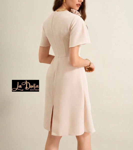 Vestido albaricoque con flor 3D