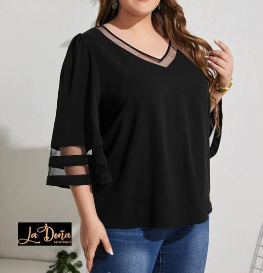 Blusa negra con manga