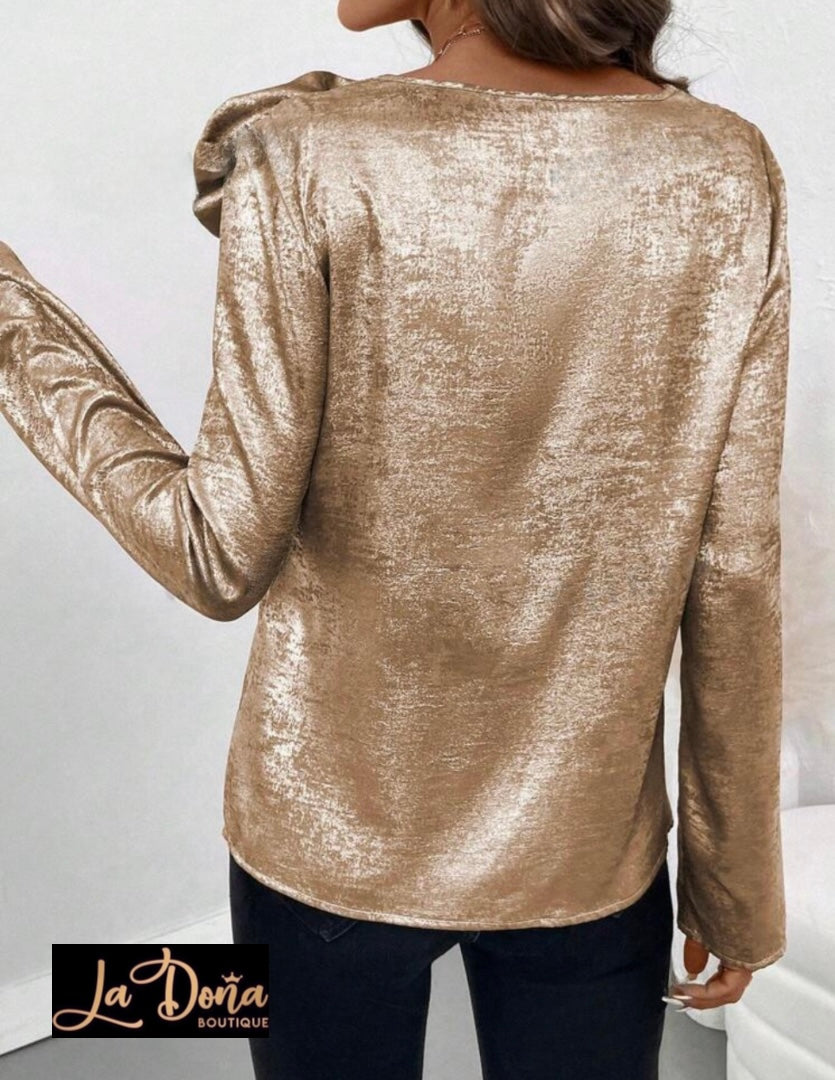 Blusa metalica con flor 3D