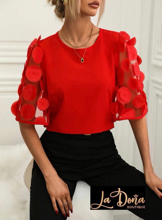 Blusa con círculos en mangas