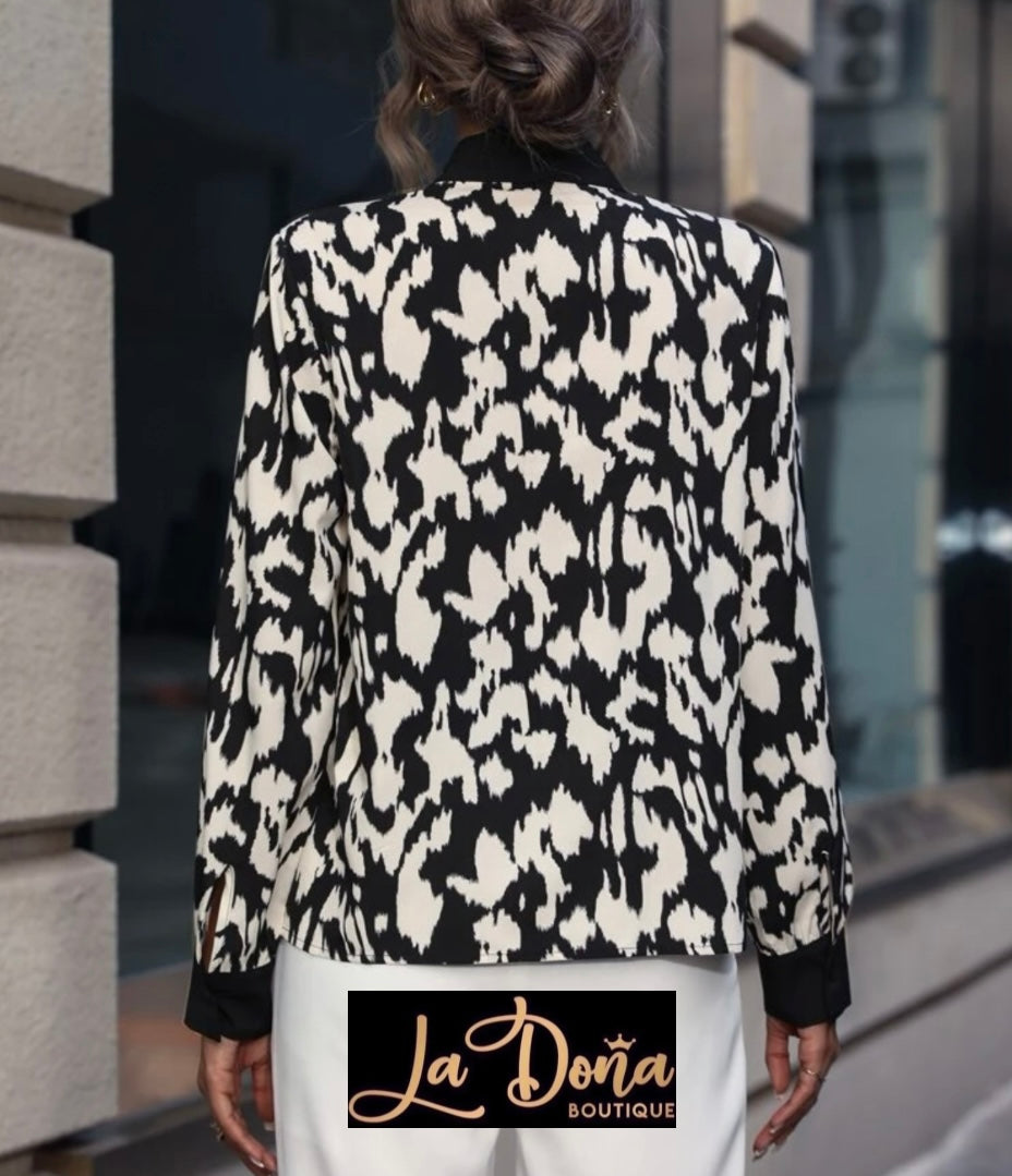 Blusa leopardo moño