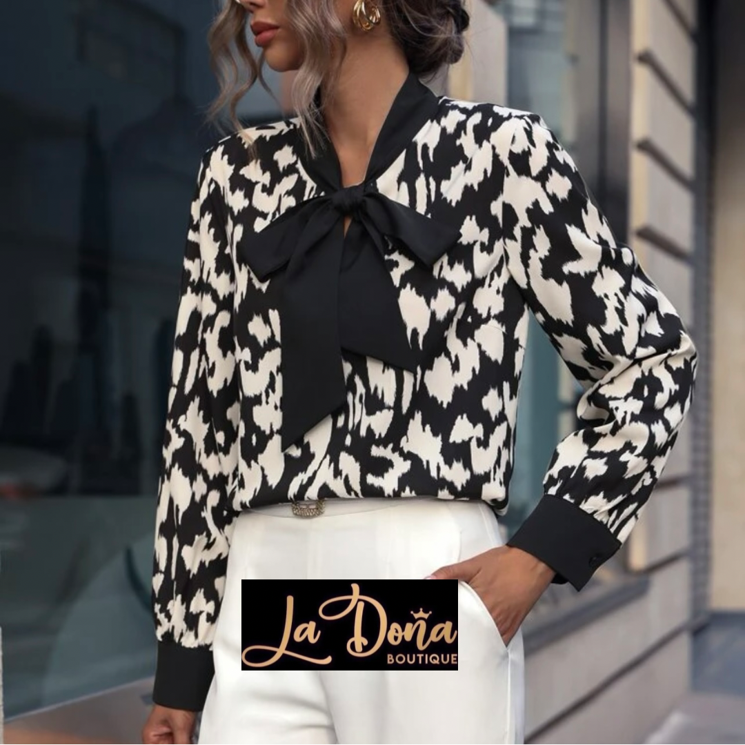 Blusa leopardo moño