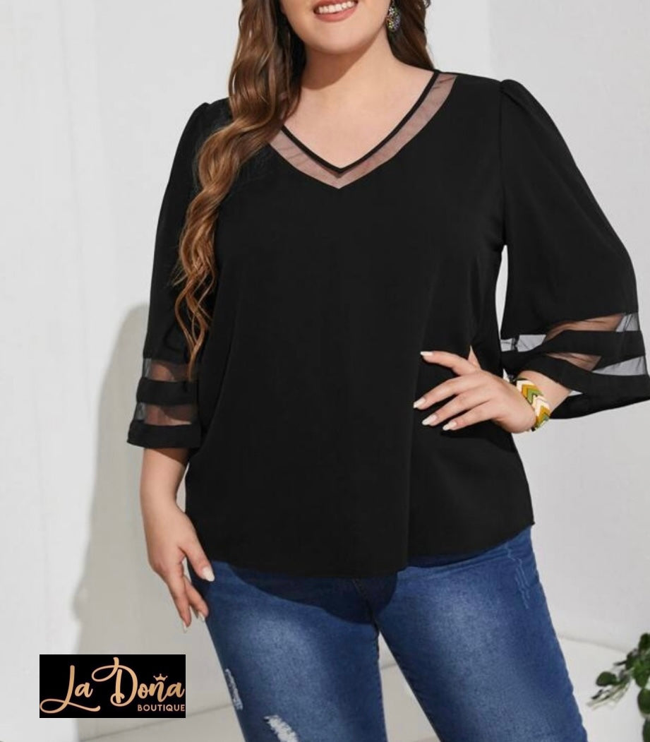 Blusa negra con manga