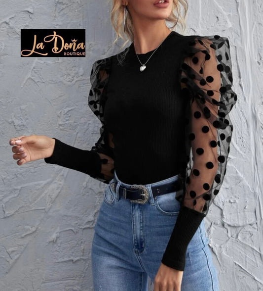 Lusa negra con lunares