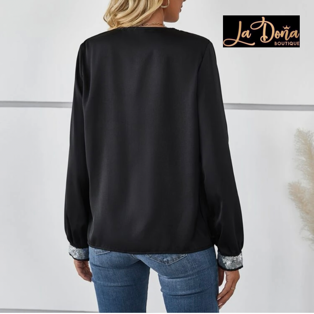 Blusa negra con lentejuela plata