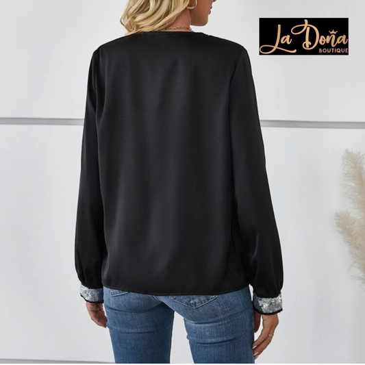 Blusa negra con lentejuela plata