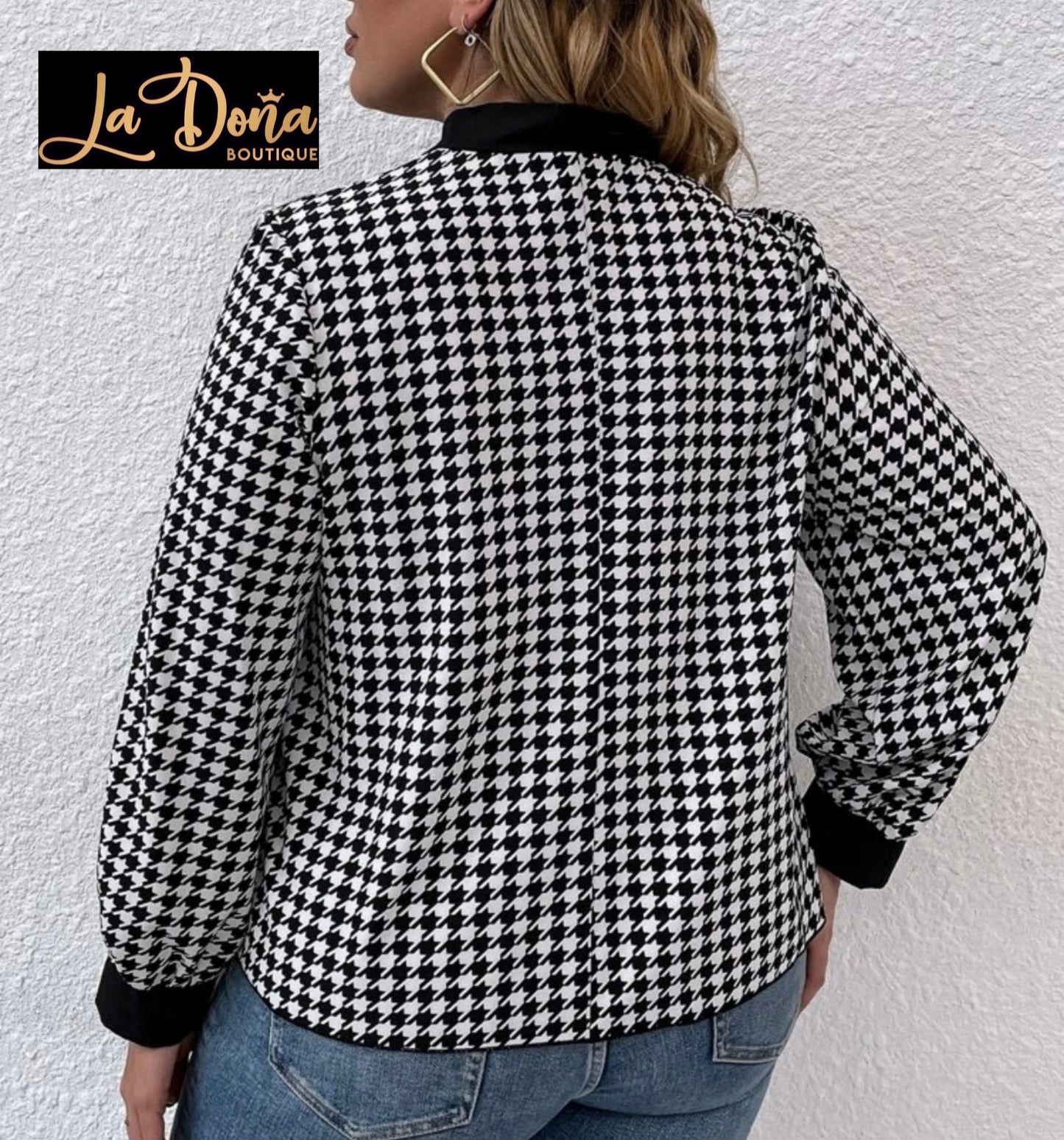 Blusa estampada con moño negro