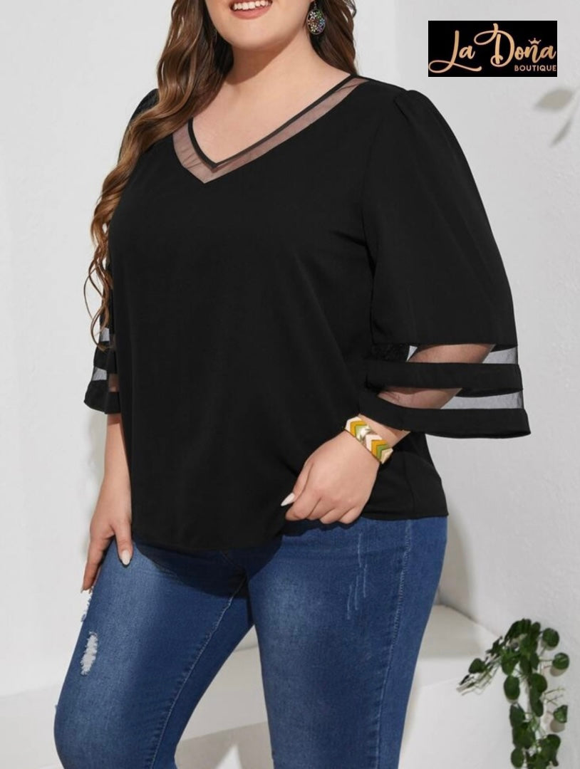 Blusa negra con manga