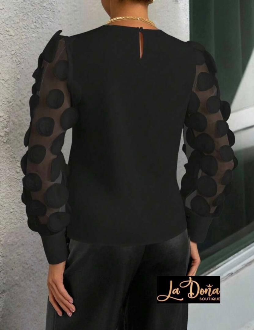 Blusa círculos manga larga