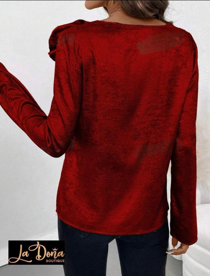 Blusa metalica con flor 3D