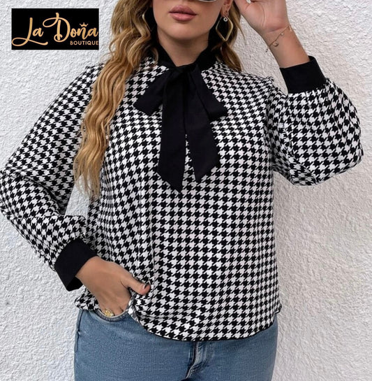 Blusa estampada con moño negro